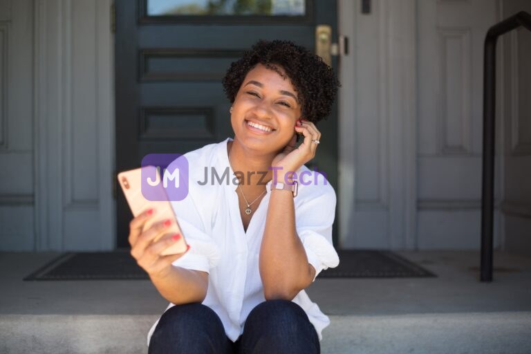 Girl sitting on office building step